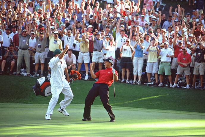 The trademark Tiger Woods fist pump, when he won the Masters in 2005 (Neil Liefer, Sports Illustrated)